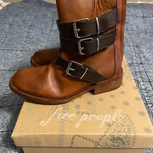 Free People Moto boots with buckles.